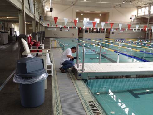 Description: Description: RAMON CARING FOR POOL EQUIPMENT